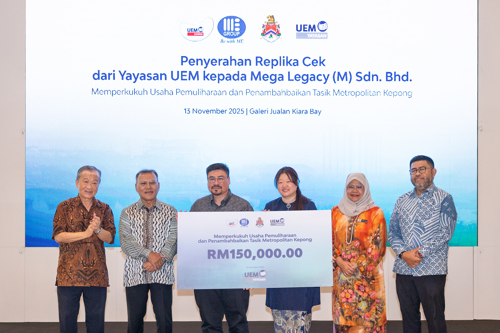 Replica Cheque from Yayasan UEM to Mega Legacy